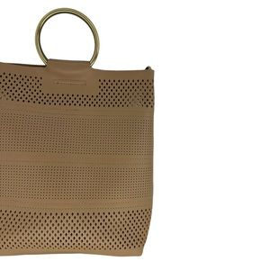 By Anthropologie Perforated Ring Handle Bag